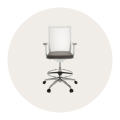 Work chair. Ergonomic Counter chair in white and grey with a round footrest in front of a beige, round background