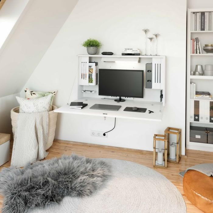 White wall shelf / wall secretary as a hidden and space-saving home office